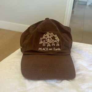 Palo Santo Studios Peace On Earth brown baseball cap